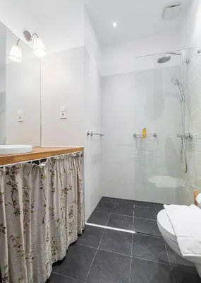 Łazienka w obiekcie RentPlanet - Studio Białobrzeska
