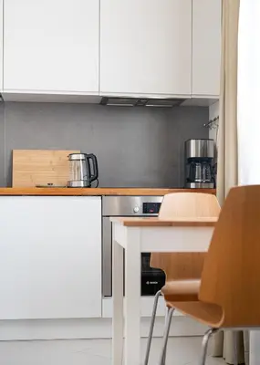 Kuchnia lub aneks kuchenny w obiekcie RentPlanet - Studio Białobrzeska