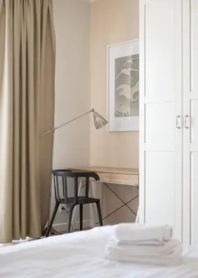 Łóżko lub łóżka w pokoju w obiekcie RentPlanet - Studio Białobrzeska