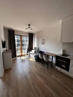 Kuchnia lub aneks kuchenny w obiekcie A63 by Real Apartment