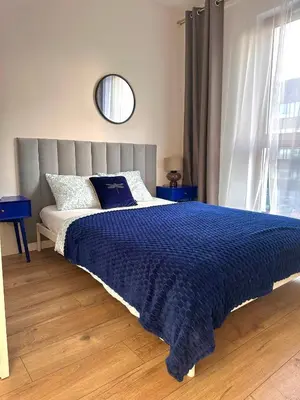 Łóżko lub łóżka w pokoju w obiekcie A63 by Real Apartment