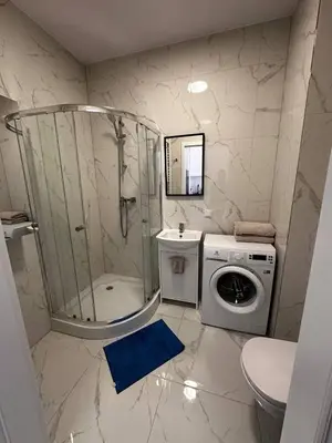 Łazienka w obiekcie A63 by Real Apartment