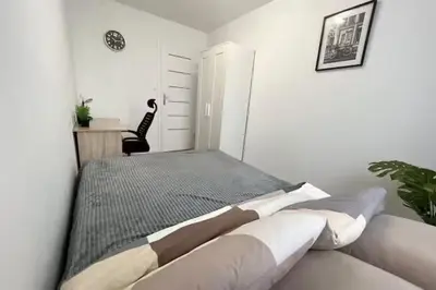 Łóżko lub łóżka w pokoju w obiekcie Rentel Hostel