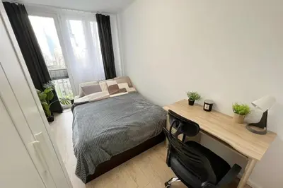 Łóżko lub łóżka w pokoju w obiekcie Rentel Home