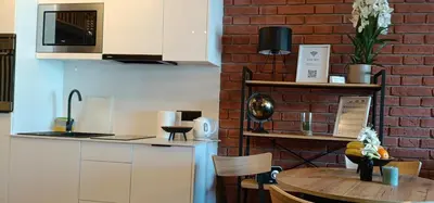 Kuchnia lub aneks kuchenny w obiekcie Prestige Loft