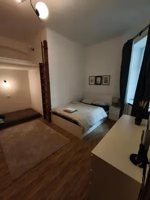 Łóżko lub łóżka w pokoju w obiekcie Apartament Centrum