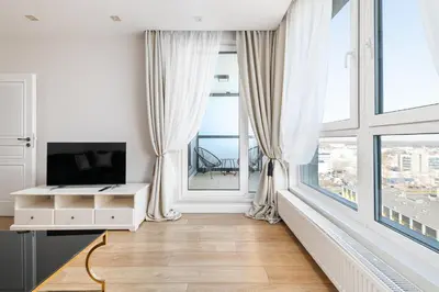 Telewizja i/lub zestaw kina domowego w obiekcie RentPlanet - Apartament Rodziewiczówny