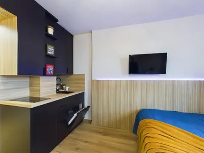 Kuchnia lub aneks kuchenny w obiekcie Modern Air-conditioned Studio by Noclegi Renters