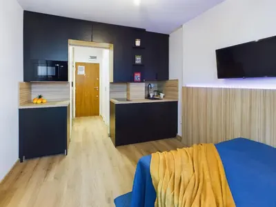 Kuchnia lub aneks kuchenny w obiekcie Modern Air-conditioned Studio by Noclegi Renters