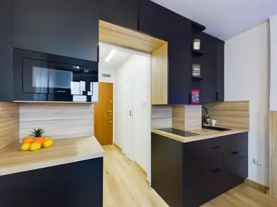 Kuchnia lub aneks kuchenny w obiekcie Modern Air-conditioned Studio by Noclegi Renters