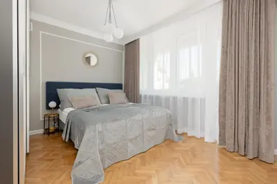 Łóżko lub łóżka w pokoju w obiekcie Apartment in the Centre of Warsaw by Noclegi Renters
