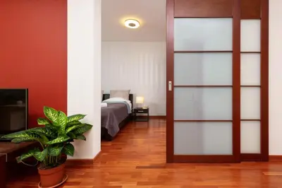 Łóżko lub łóżka w pokoju w obiekcie Apartament Lincoln Exclusive with AC in Warsaw by Renters Prestige