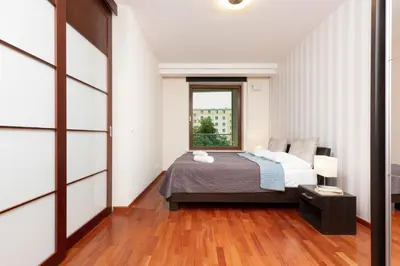 Łóżko lub łóżka w pokoju w obiekcie Apartament Lincoln Exclusive with AC in Warsaw by Renters Prestige