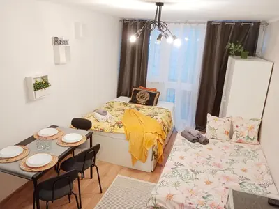 Łóżko lub łóżka w pokoju w obiekcie 1010 Warsaw Centrum