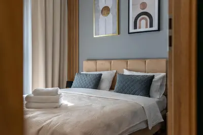 Łóżko lub łóżka w pokoju w obiekcie Varsovia Comfort 340 by BookingHost