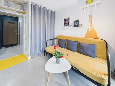 Część wypoczynkowa w obiekcie Intimate Studio Close to PGE Narodowy by Noclegi Renters