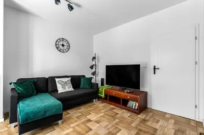 Telewizja i/lub zestaw kina domowego w obiekcie Praga Apartment - Terrace & Parking - by Rentujemy