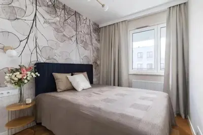 Łóżko lub łóżka w pokoju w obiekcie JetSet Airport Apartment