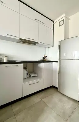 Kuchnia lub aneks kuchenny w obiekcie Cosy Stay Solidarności Avenue Apartment