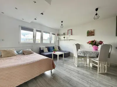 Część wypoczynkowa w obiekcie Cosy Stay Solidarności Avenue Apartment