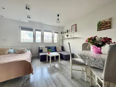 Część wypoczynkowa w obiekcie Cosy Stay Solidarności Avenue Apartment