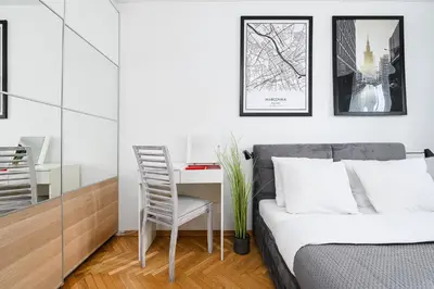 Łóżko lub łóżka w pokoju w obiekcie Lumina 2-room apart near Złote Tarasy