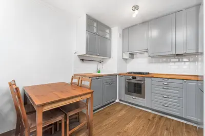 Kuchnia lub aneks kuchenny w obiekcie Apartament Grzybowska by Your Freedom
