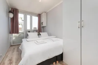 Łóżko lub łóżka w pokoju w obiekcie Apartament Grzybowska by Your Freedom