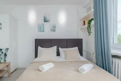 Łóżko lub łóżka w pokoju w obiekcie LYNA Home Plus - Premium Metro Residence