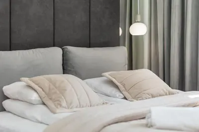Łóżko lub łóżka w pokoju w obiekcie Aleje Jerozolimskie 25 by Homeprime