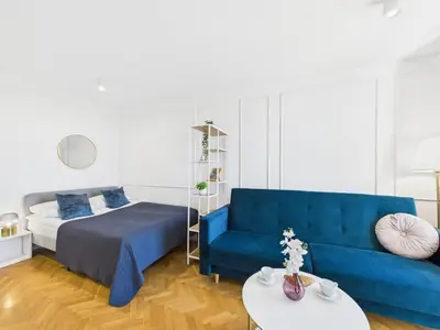Łóżko lub łóżka w pokoju w obiekcie Stylish and Bright Studio Pet-Friendly by Noclegi Renters