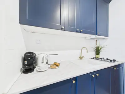 Kuchnia lub aneks kuchenny w obiekcie Stylish and Bright Studio Pet-Friendly by Noclegi Renters