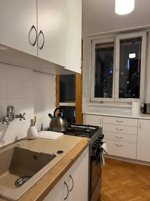 Kuchnia lub aneks kuchenny w obiekcie Pokoje w samym centrum-Walicow 20