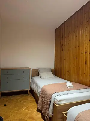 Łóżko lub łóżka w pokoju w obiekcie Pokoje w samym centrum-Walicow 20