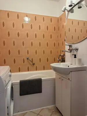 Kuchnia lub aneks kuchenny w obiekcie Pokoje w samym centrum-Walicow 20