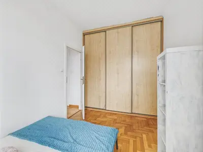 Łóżko lub łóżka w pokoju w obiekcie Przytulne, jasne 40m2 na Starej Pradze, 3min do M