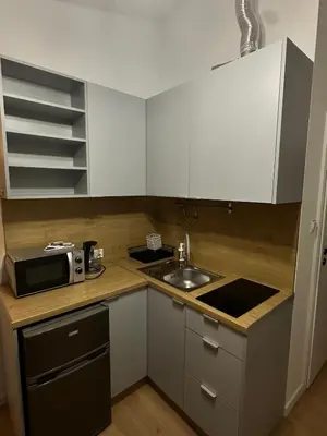 Kuchnia lub aneks kuchenny w obiekcie Stylowa Kawalerka z WiFi Praga Mińska 22 Blisko PGE Narodowego