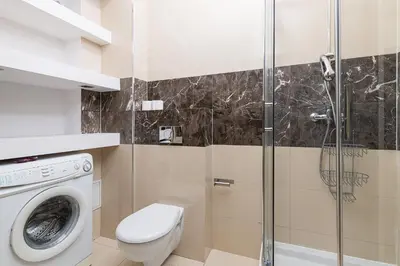 Łazienka w obiekcie RentPlanet - Apartamenty Chmielna