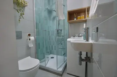 Łazienka w obiekcie The Green Nest Apartment Wola Rondo Daszynskiego