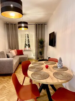 Telewizja i/lub zestaw kina domowego w obiekcie Apartament Flamingo Old Town