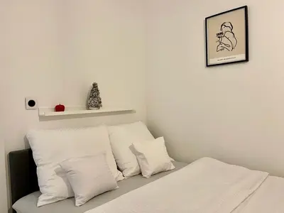 Łóżko lub łóżka w pokoju w obiekcie Apartament Flamingo Old Town
