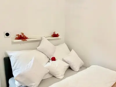 Łóżko lub łóżka w pokoju w obiekcie Apartament Flamingo Old Town