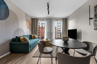 Część wypoczynkowa w obiekcie National Stadium Deluxe Apartment by BookingHost