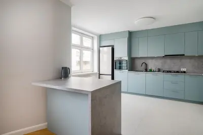 Kuchnia lub aneks kuchenny w obiekcie Ząbkowska 2-Bedroom Apartment by BookingHost
