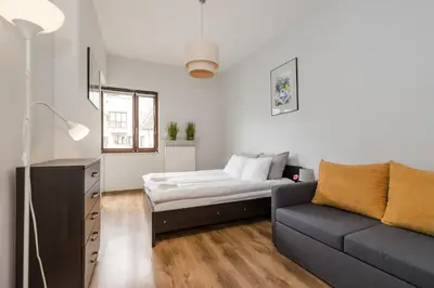 Łóżko lub łóżka w pokoju w obiekcie ShortStayPoland Giełdowa B184