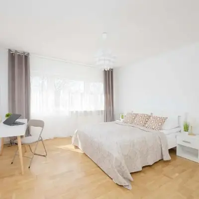Bright Apartment in Warsaw's Wola Next to the Metro by Noclegi Renters