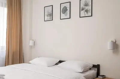 Łóżko lub łóżka w pokoju w obiekcie Metro Wilanowska Cosy Apartment by BookingHost