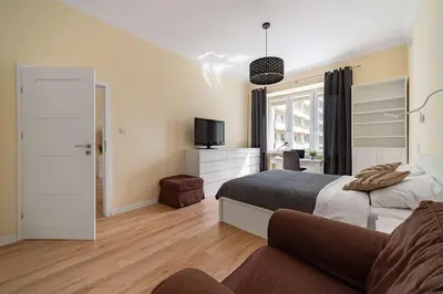 Łóżko lub łóżka w pokoju w obiekcie Luxury Apartment on Zlota Street