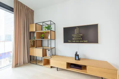 Telewizja i/lub zestaw kina domowego w obiekcie Towarowa Towers Suites