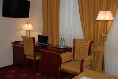 Telewizja i/lub zestaw kina domowego w obiekcie Hotel Holiday Park